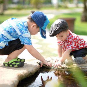 Two children playing in water